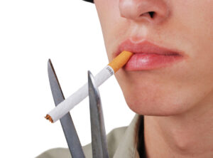 Diane Edwards cutting-off-cigarette--300x222 Stop Smoking Online  
